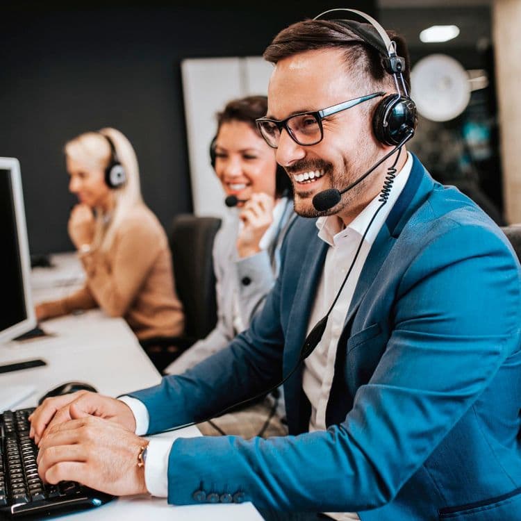 Man with a headset, possibly working in a call centre.