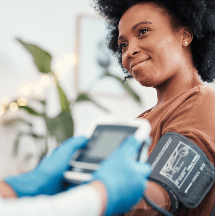 Woman getting her blood pressure taken.