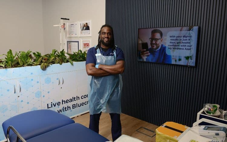 Bluecrest employee standing in one of the assessment rooms.