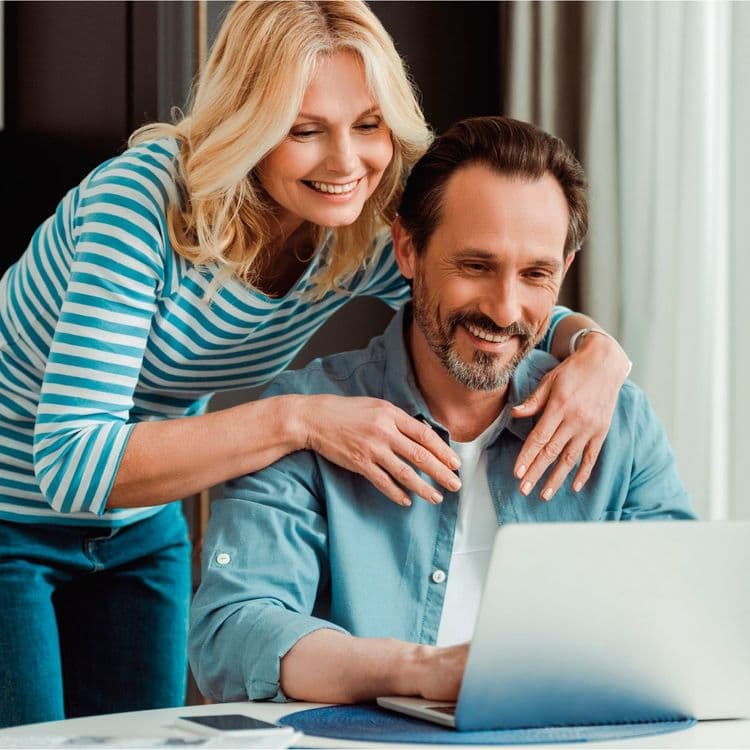 Couple checking their Bluecrest Health Check Personal Results report online